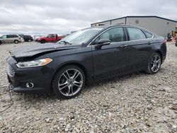 Salvage cars for sale at Wayland, MI auction: 2014 Ford Fusion Titanium