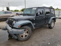 Salvage cars for sale from Copart Miami, FL: 2012 Jeep Wrangler Unlimited Sport