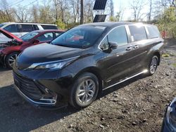 Flood-damaged cars for sale at auction: 2021 Toyota Sienna XLE
