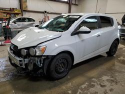 Salvage cars for sale from Copart Nisku, AB: 2013 Chevrolet Sonic LT