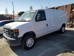 Salvage cars for sale from Copart Wilmington, CA: 2009 Ford Econoline E150 Van