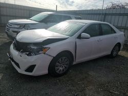 Salvage cars for sale from Copart Arlington, WA: 2014 Toyota Camry L