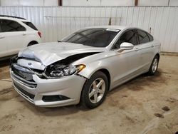 Salvage cars for sale at Lansing, MI auction: 2016 Ford Fusion SE