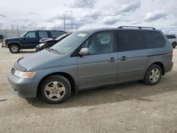 Salvage cars for sale from Copart Nisku, AB: 2000 Honda Odyssey EX