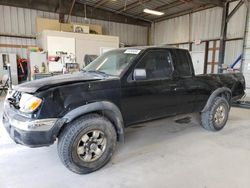Salvage trucks for sale at Rogersville, MO auction: 1999 Nissan Frontier King Cab XE