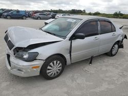 Salvage cars for sale from Copart West Palm Beach, FL: 2002 Mitsubishi Lancer ES