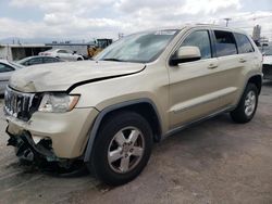Salvage cars for sale from Copart Sun Valley, CA: 2012 Jeep Grand Cherokee Laredo