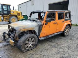 Salvage vehicles for parts for sale at auction: 2012 Jeep Wrangler Unlimited Sahara