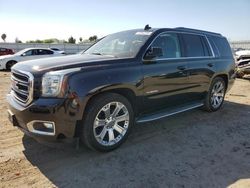 Carros salvage a la venta en subasta: 2016 GMC Yukon SLE