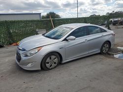 Salvage cars for sale from Copart Orlando, FL: 2012 Hyundai Sonata Hybrid