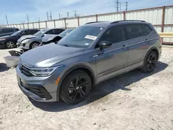 Salvage cars for sale from Copart Haslet, TX: 2023 Volkswagen Tiguan SE R-LINE Black