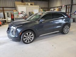 Salvage cars for sale from Copart Rogersville, MO: 2019 Cadillac XT4 Premium Luxury