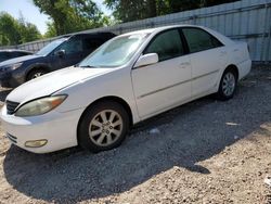 Flood-damaged cars for sale at auction: 2004 Toyota Camry LE