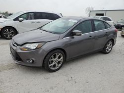 Salvage cars for sale from Copart Kansas City, KS: 2013 Ford Focus Titanium