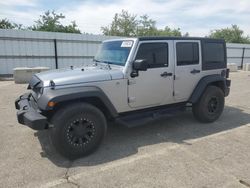 Salvage cars for sale at Fresno, CA auction: 2017 Jeep Wrangler Unlimited Sport