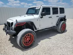 Salvage cars for sale from Copart Arcadia, FL: 2014 Jeep Wrangler Unlimited Sport