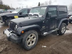 Salvage cars for sale from Copart Bowmanville, ON: 2013 Jeep Wrangler Sahara