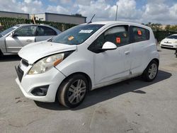 Salvage cars for sale from Copart Orlando, FL: 2014 Chevrolet Spark 1LT