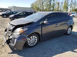 Salvage cars for sale from Copart Arlington, WA: 2014 Toyota Prius PLUG-IN