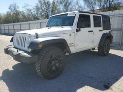 Salvage SUVs for sale at auction: 2016 Jeep Wrangler Unlimited Sport