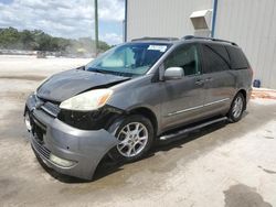 Salvage cars for sale at Apopka, FL auction: 2005 Toyota Sienna XLE