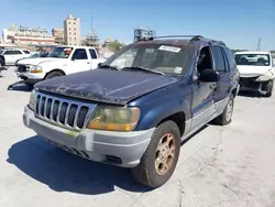 Salvage cars for sale from Copart New Orleans, LA: 2001 Jeep Grand Cherokee Laredo