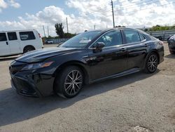 Salvage cars for sale at Miami, FL auction: 2021 Toyota Camry SE