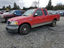 Salvage cars for sale from Copart Graham, WA: 2002 Ford F150