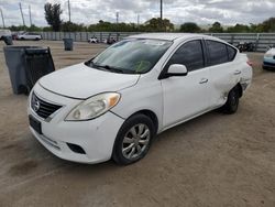 Salvage cars for sale from Copart Miami, FL: 2014 Nissan Versa S