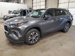 Salvage cars for sale at Blaine, MN auction: 2022 Toyota Highlander XLE