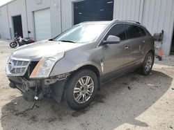 Salvage cars for sale from Copart Jacksonville, FL: 2011 Cadillac SRX Luxury Collection