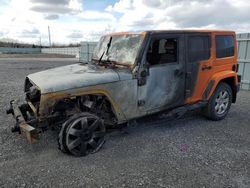 Vehiculos salvage en venta de Copart Ontario Auction, ON: 2012 Jeep Wrangler Unlimited Sahara