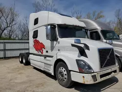 Salvage trucks for sale at Elgin, IL auction: 2014 Volvo VN VNL