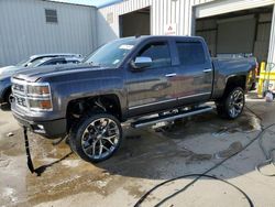 Vehiculos salvage en venta de Copart New Orleans, LA: 2014 Chevrolet Silverado K1500 LTZ