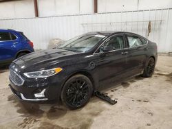 Salvage cars for sale at Lansing, MI auction: 2019 Ford Fusion Titanium