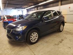 Salvage cars for sale at Wheeling, IL auction: 2014 Mazda CX-5 Touring