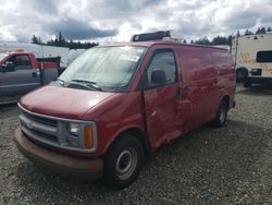 Salvage trucks for sale at Graham, WA auction: 2001 Chevrolet Express G1500
