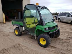 Buy Salvage Motorcycles For Sale now at auction: 2014 John Deere Gator