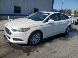 Salvage cars for sale from Copart Orlando, FL: 2014 Ford Fusion SE