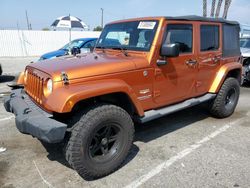 Salvage cars for sale at Van Nuys, CA auction: 2011 Jeep Wrangler Unlimited Sahara