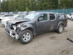Salvage cars for sale at Graham, WA auction: 2009 Nissan Frontier Crew Cab SE