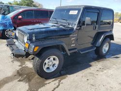 Salvage cars for sale from Copart Orlando, FL: 2002 Jeep Wrangler / TJ Sport