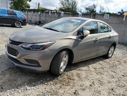 Salvage cars for sale at Opa Locka, FL auction: 2017 Chevrolet Cruze LT