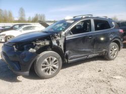 Salvage cars for sale at Arlington, WA auction: 2018 Toyota Rav4 HV LE