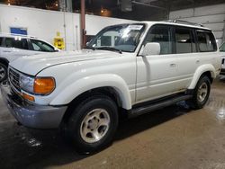 Salvage cars for sale from Copart Blaine, MN: 1997 Toyota Land Cruiser HJ85