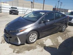 Salvage cars for sale from Copart Sun Valley, CA: 2021 Toyota Prius Prime LE