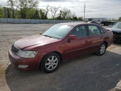 Salvage cars for sale from Copart Bridgeton, MO: 2002 Toyota Avalon XL