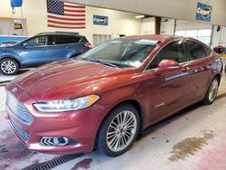 Salvage cars for sale from Copart Angola, NY: 2014 Ford Fusion SE Hybrid