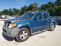 Salvage cars for sale at Ocala, FL auction: 2005 Nissan Frontier Crew Cab LE