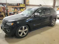 Buy Salvage Cars For Sale now at auction: 2014 Jeep Grand Cherokee Overland